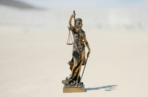 Lady justice: Who is qualified to judge God?